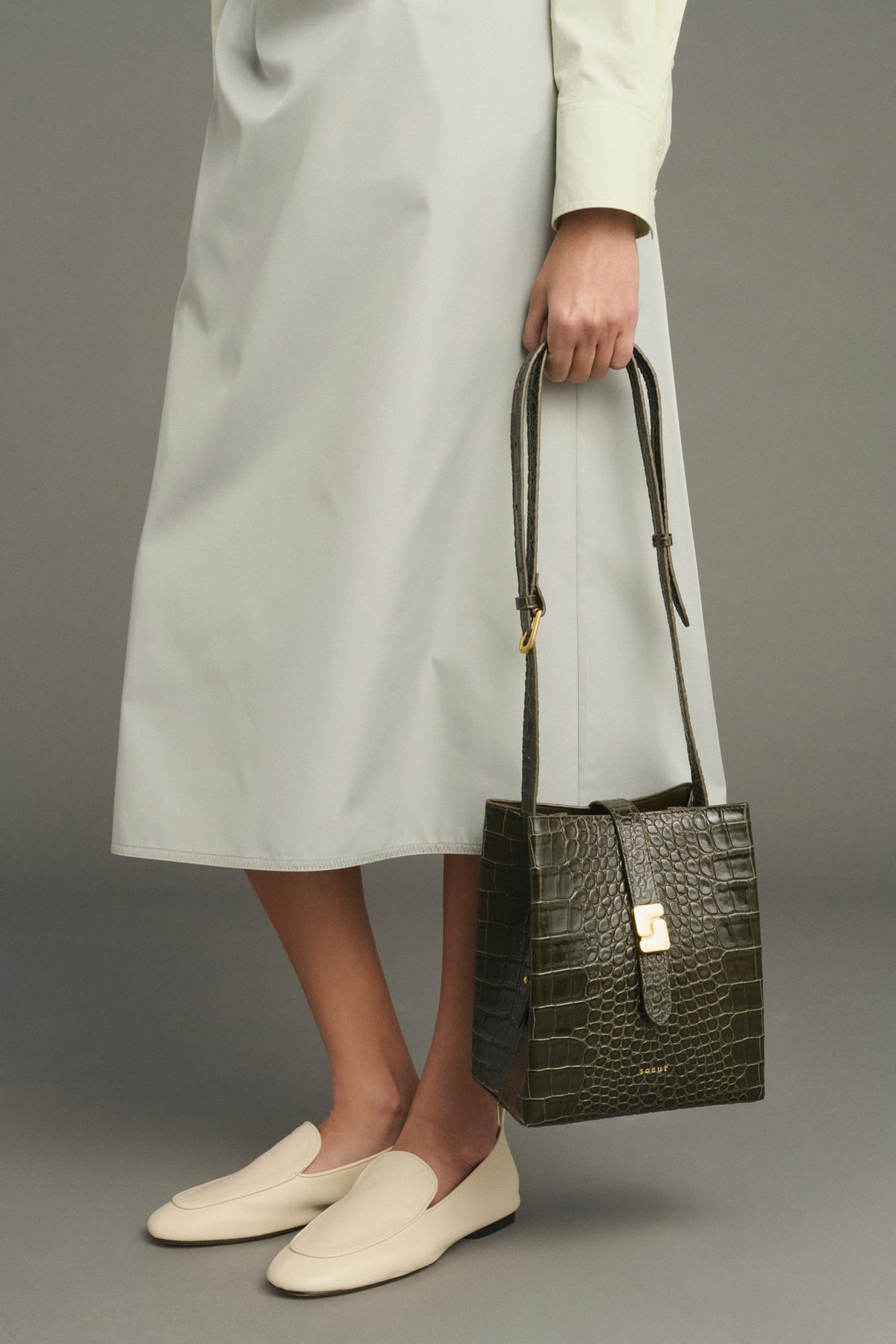 Petit sac seau à boucle S en croûte de cuir
