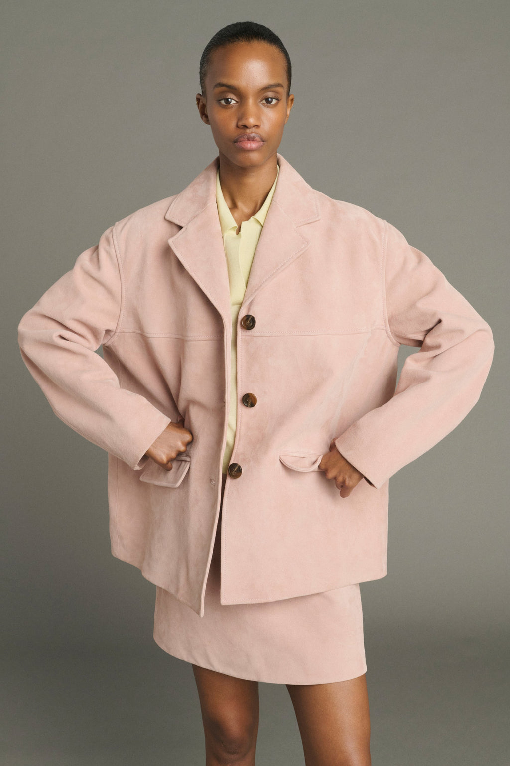 Veste boutonnée en croûte de cuir