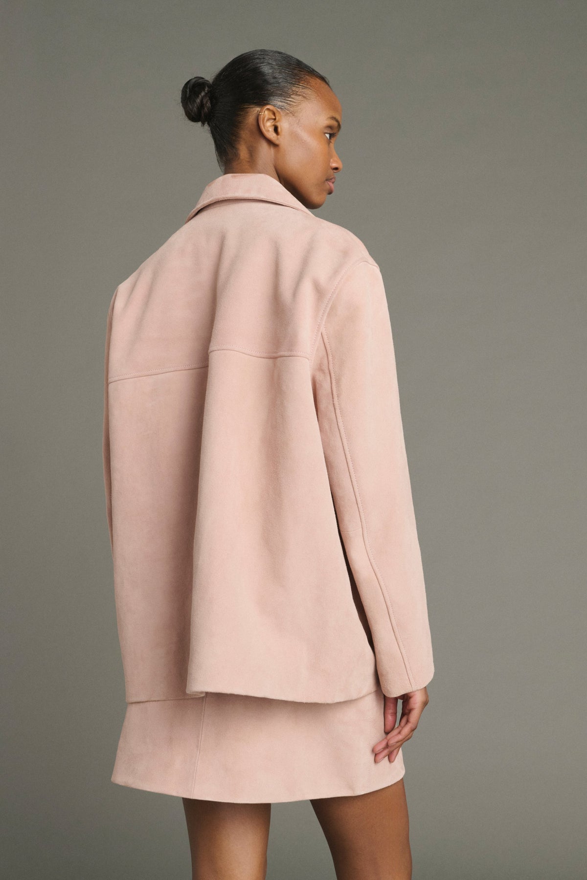Veste boutonnée en croûte de cuir