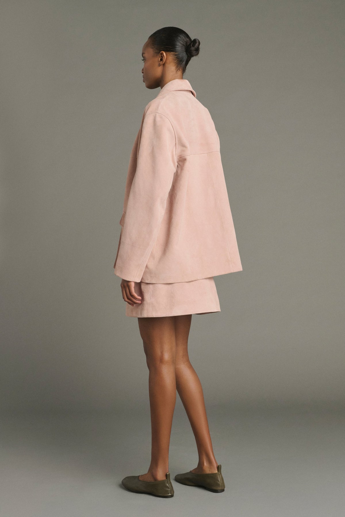 Veste boutonnée en croûte de cuir