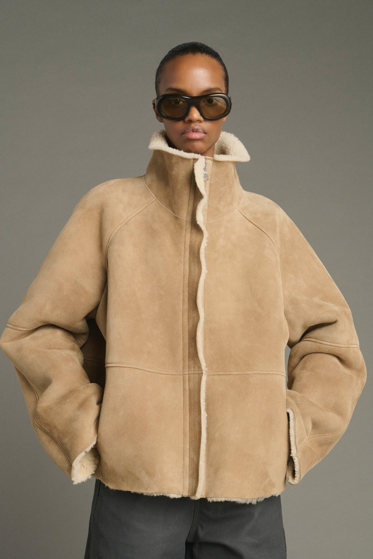 Blouson raglan en peau lainée