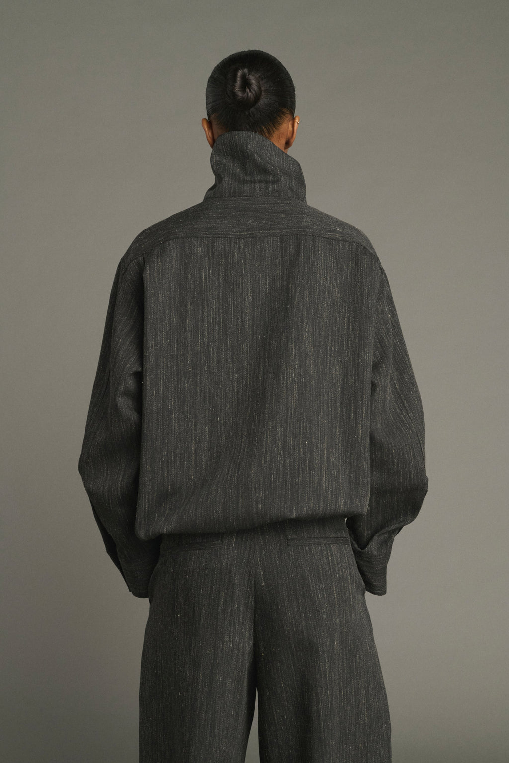 Vareuse asymétrique en toile de laine chinée