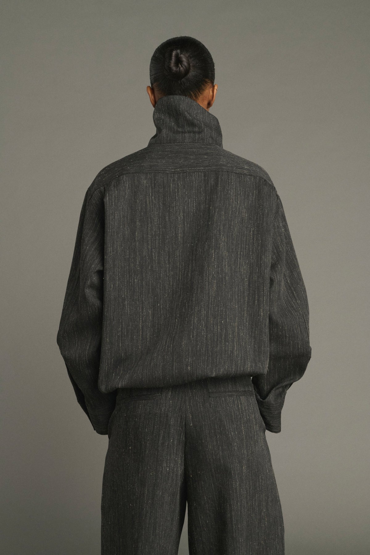 Vareuse asymétrique en toile de laine chinée