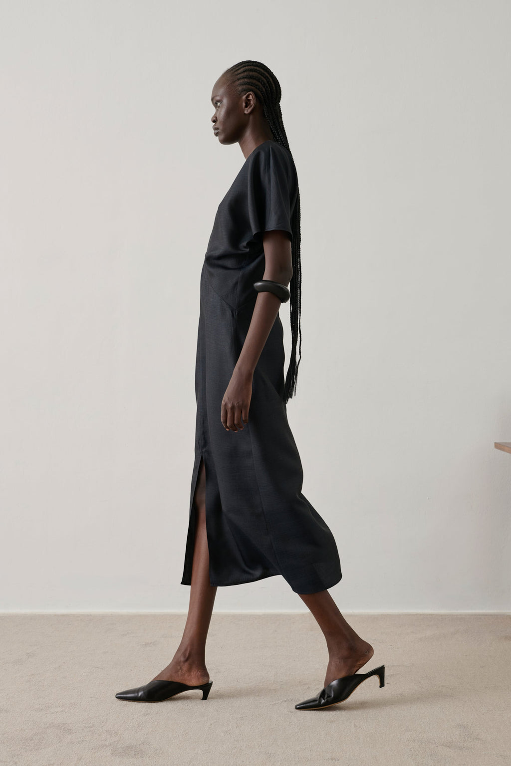 Robe en soie drapée