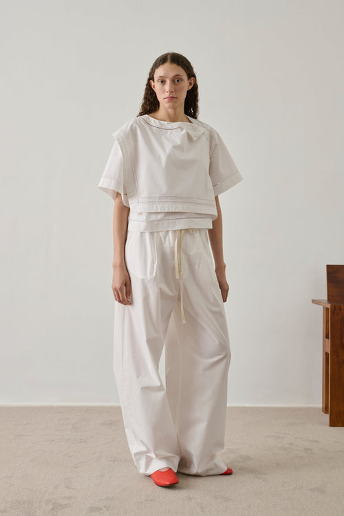 Blouse asymétrique en coton brodée