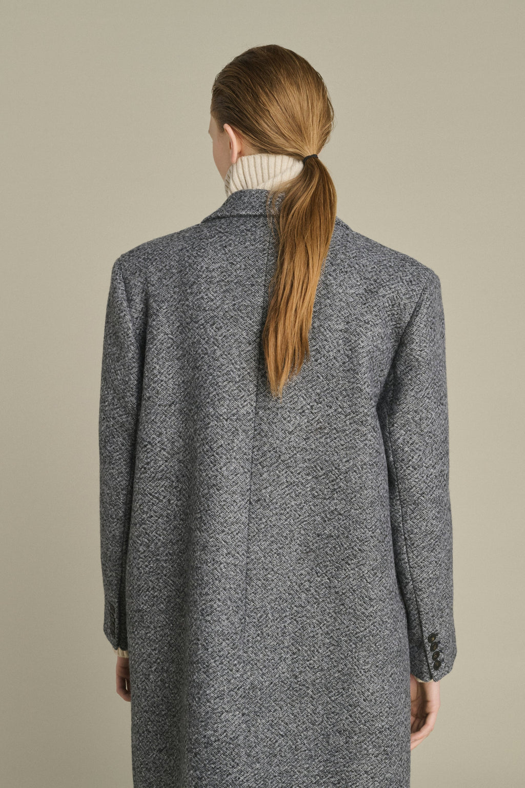 Manteau tailleur en laine mouchetée