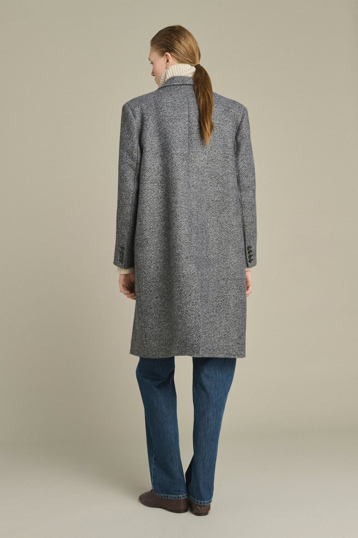Manteau tailleur en laine mouchetée