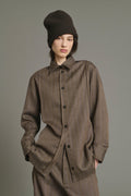 Chemise texturée à surpiqures apparentes