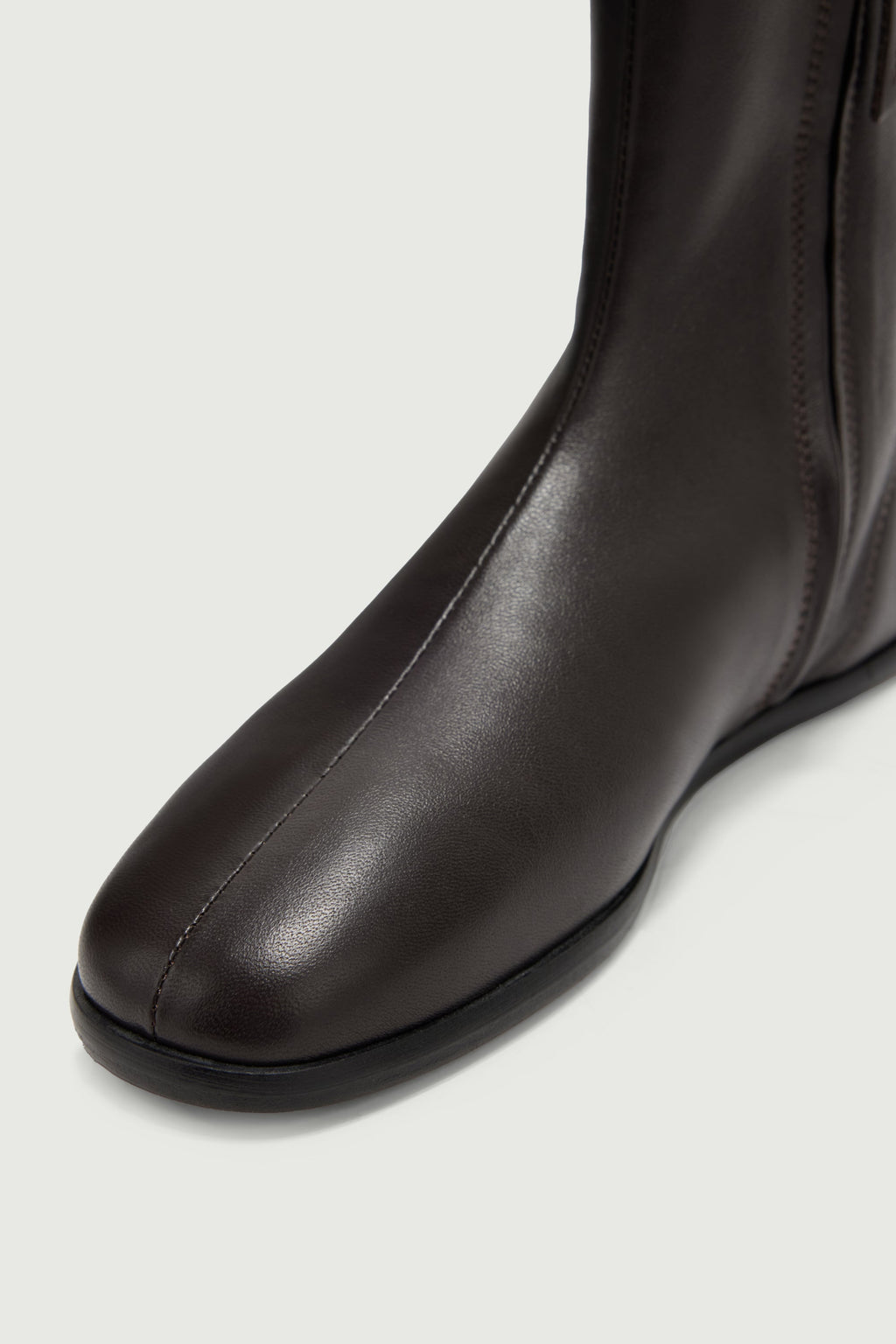 Bottines chaussettes extra-plate en cuir souple