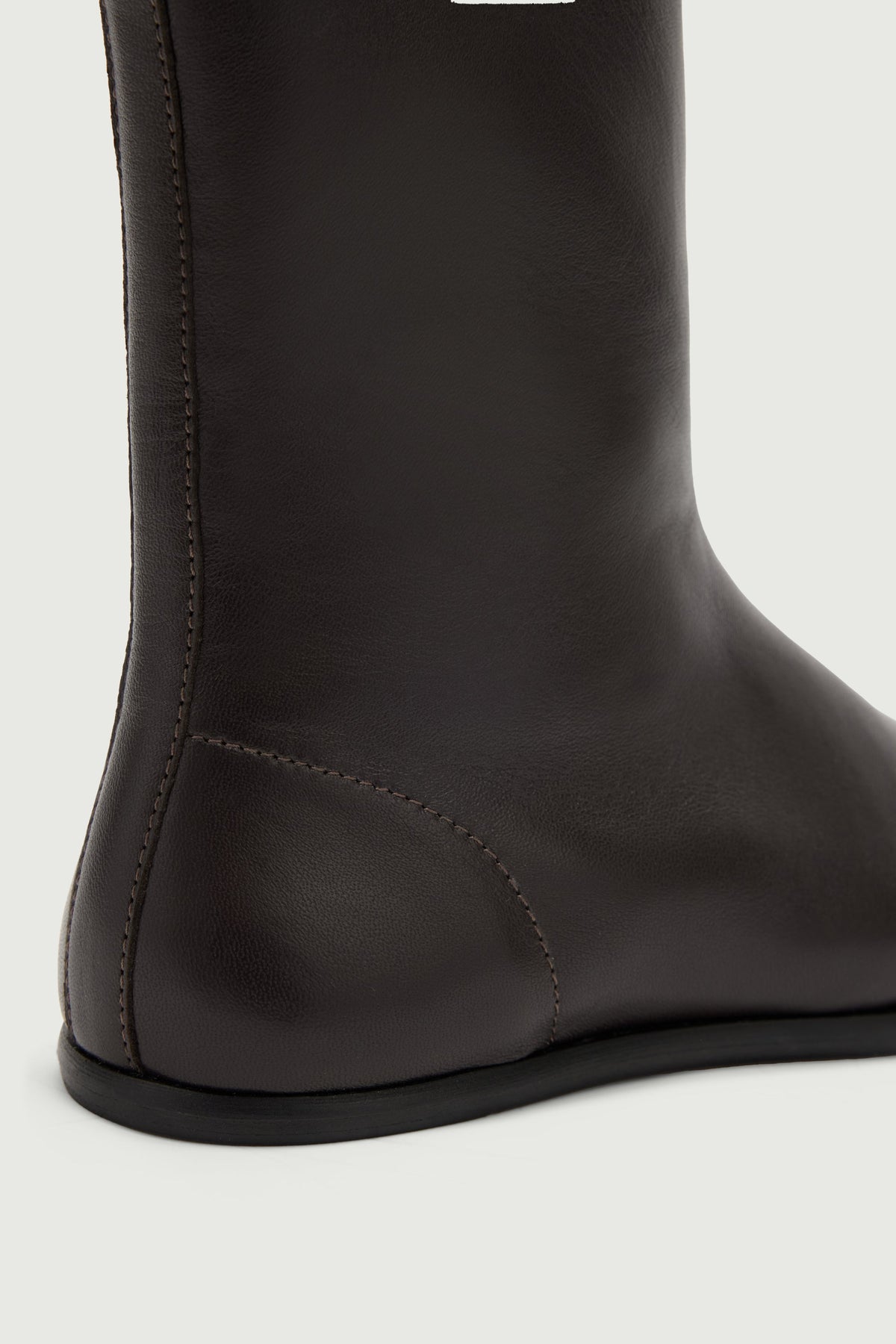 Bottines chaussettes extra-plate en cuir souple
