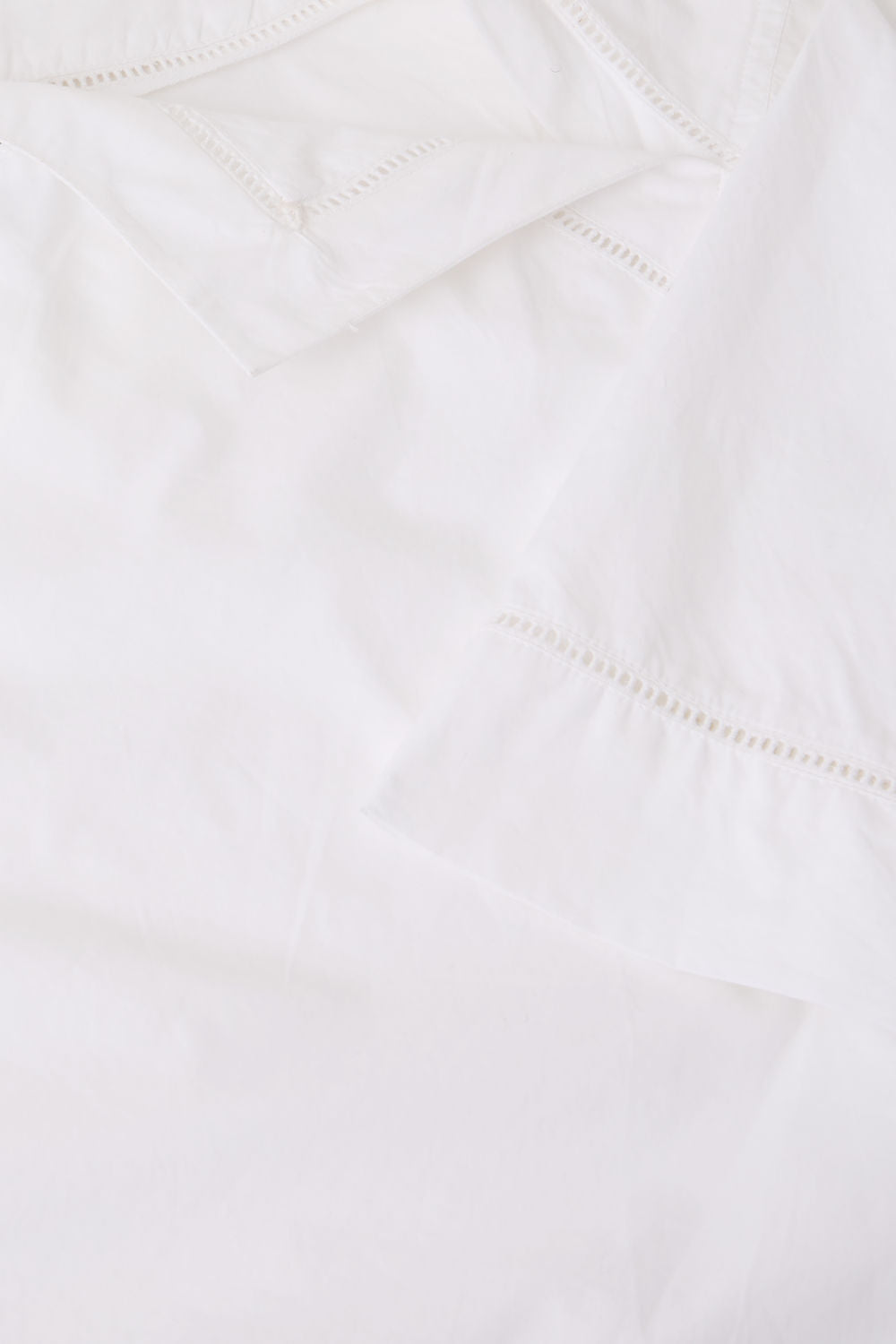 Blouse asymétrique en coton brodée