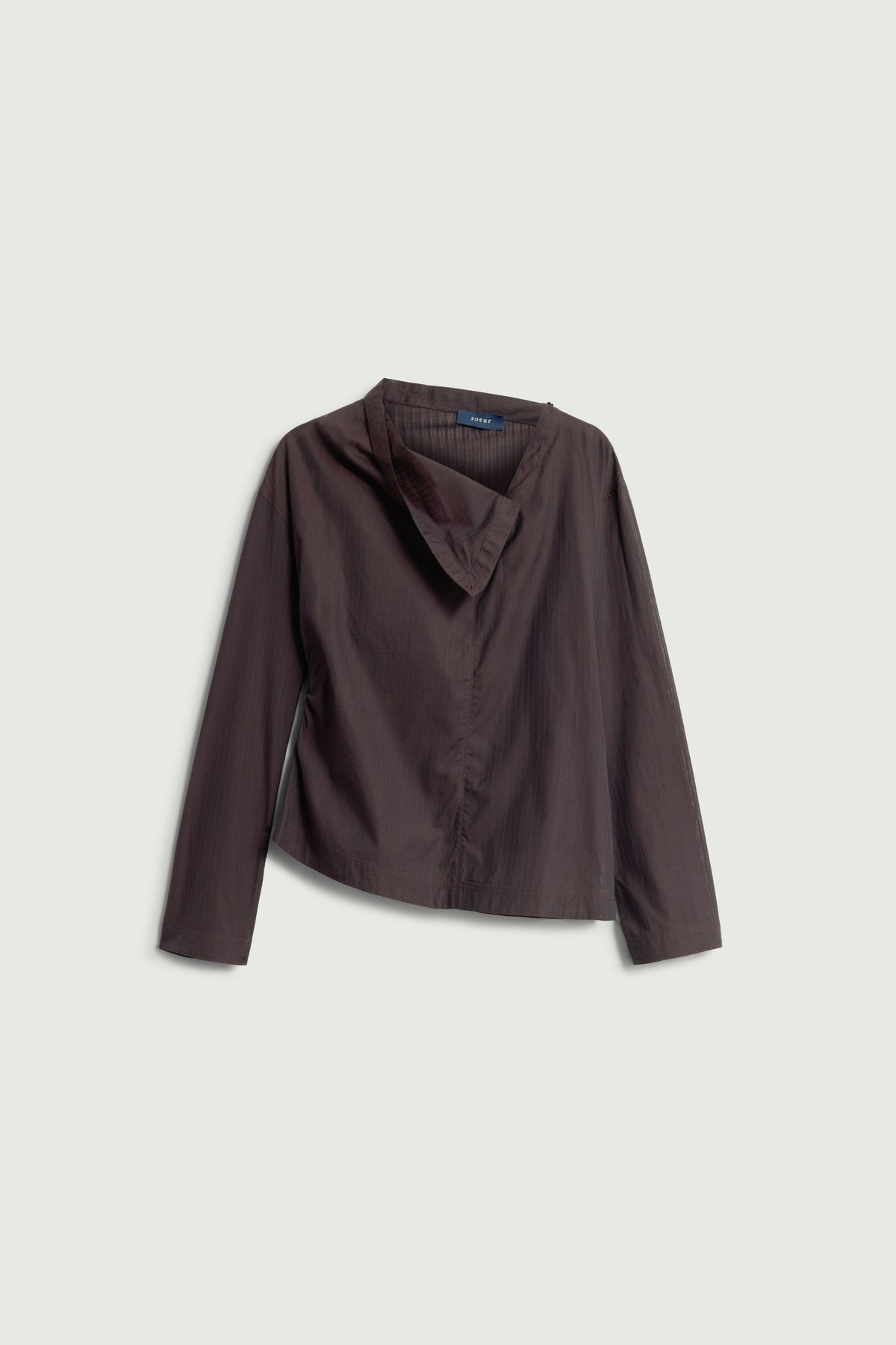 Blouse cintrée à coupe asymétrique