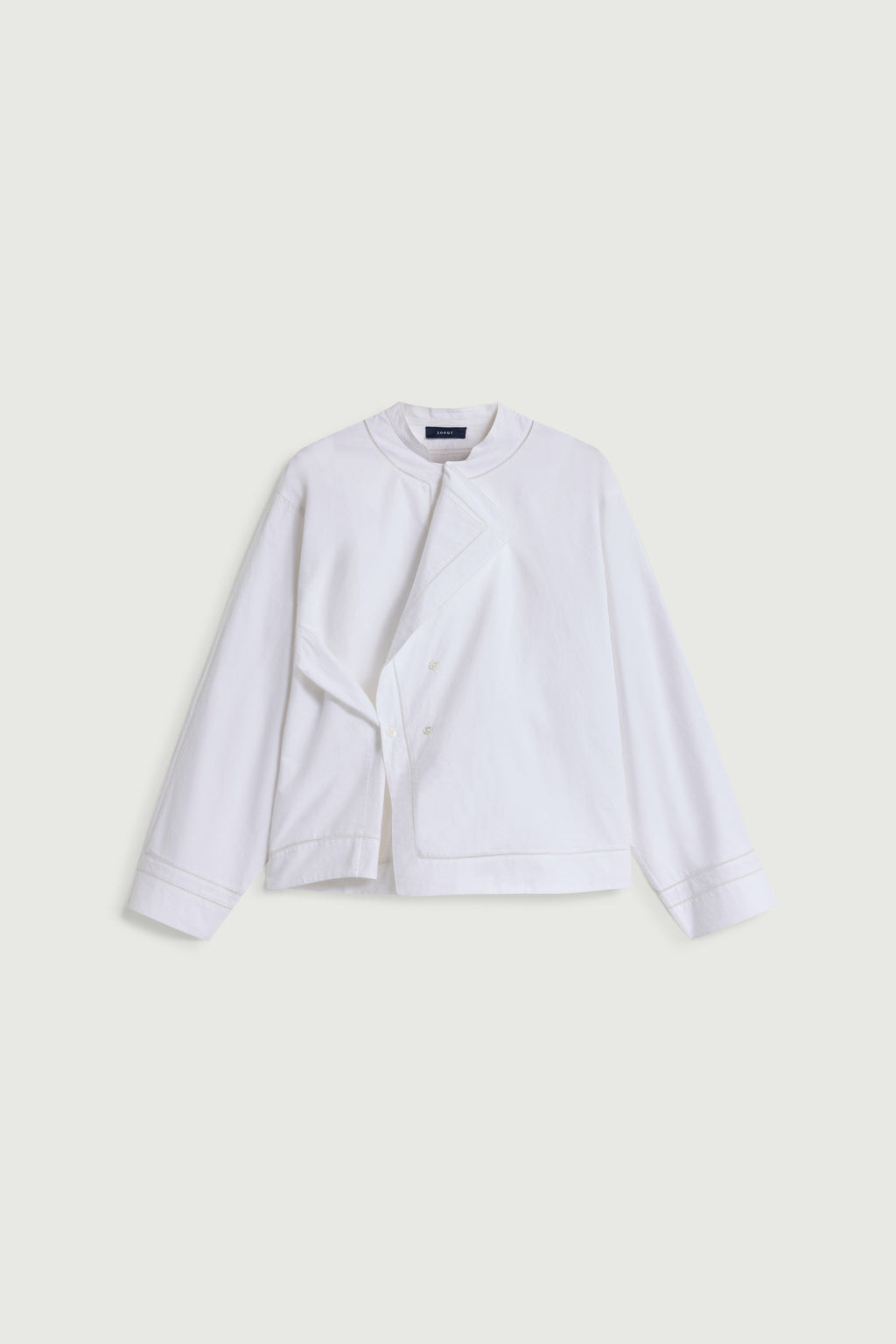 Chemise brodée à jours échelle et double boutonnage