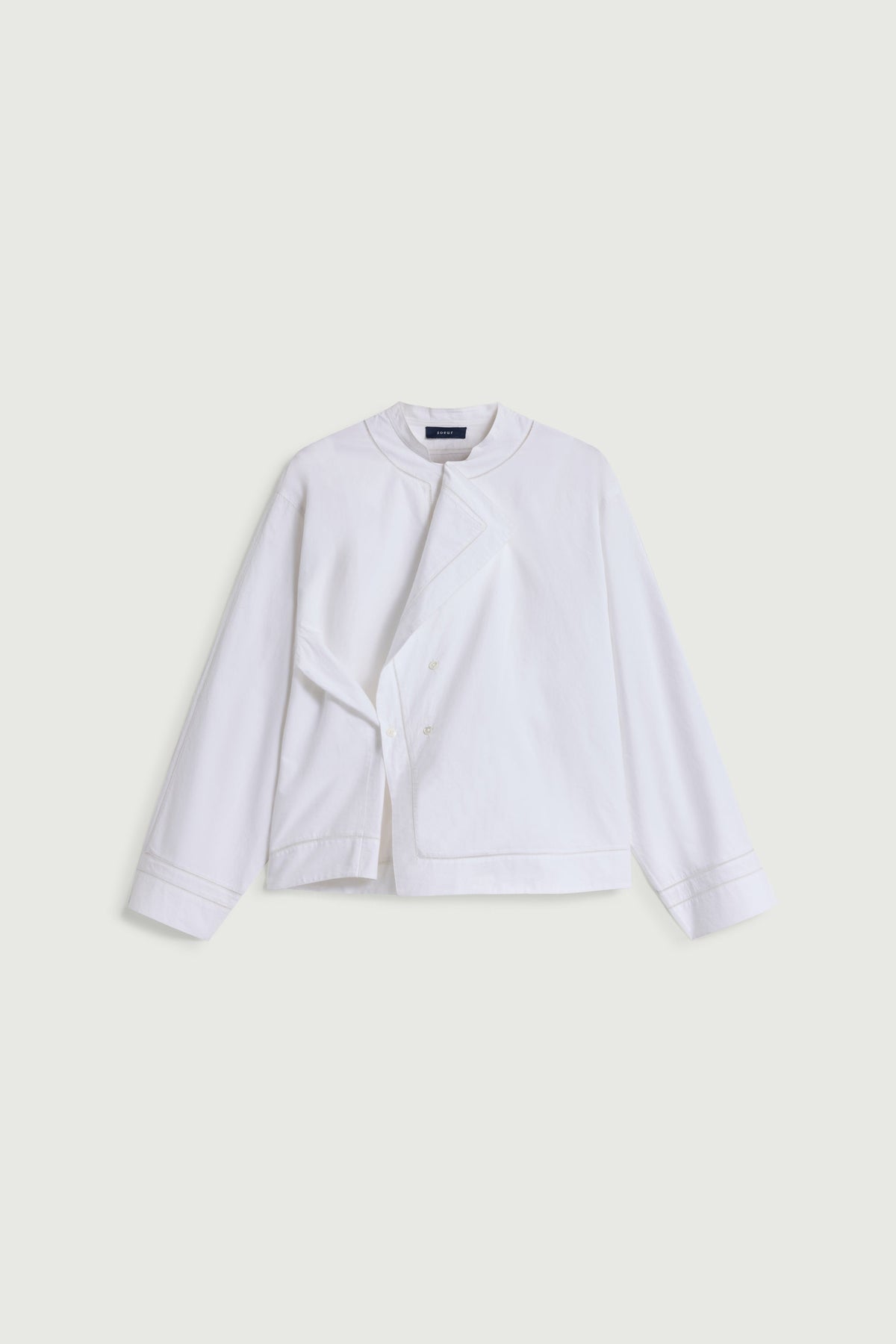 Chemise brodée à jours échelle et double boutonnage