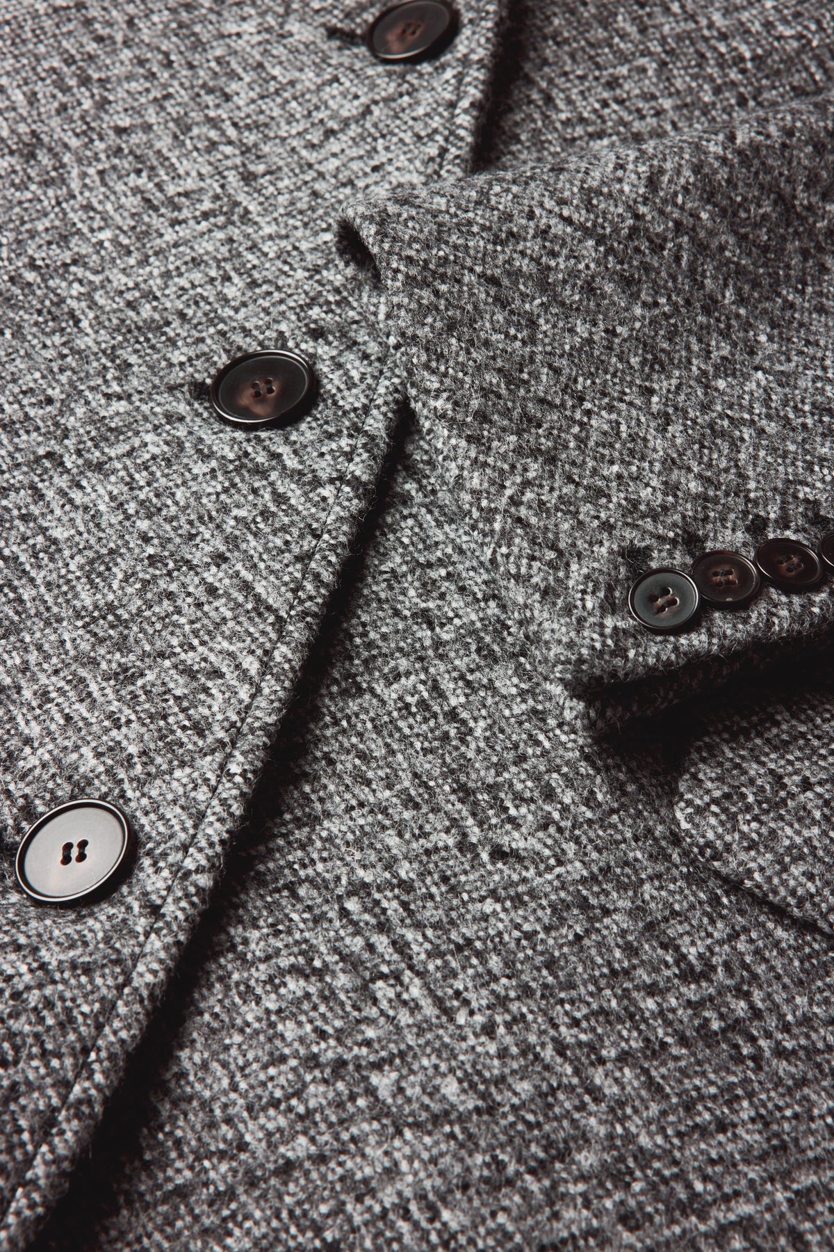 Manteau tailleur en laine mouchetée