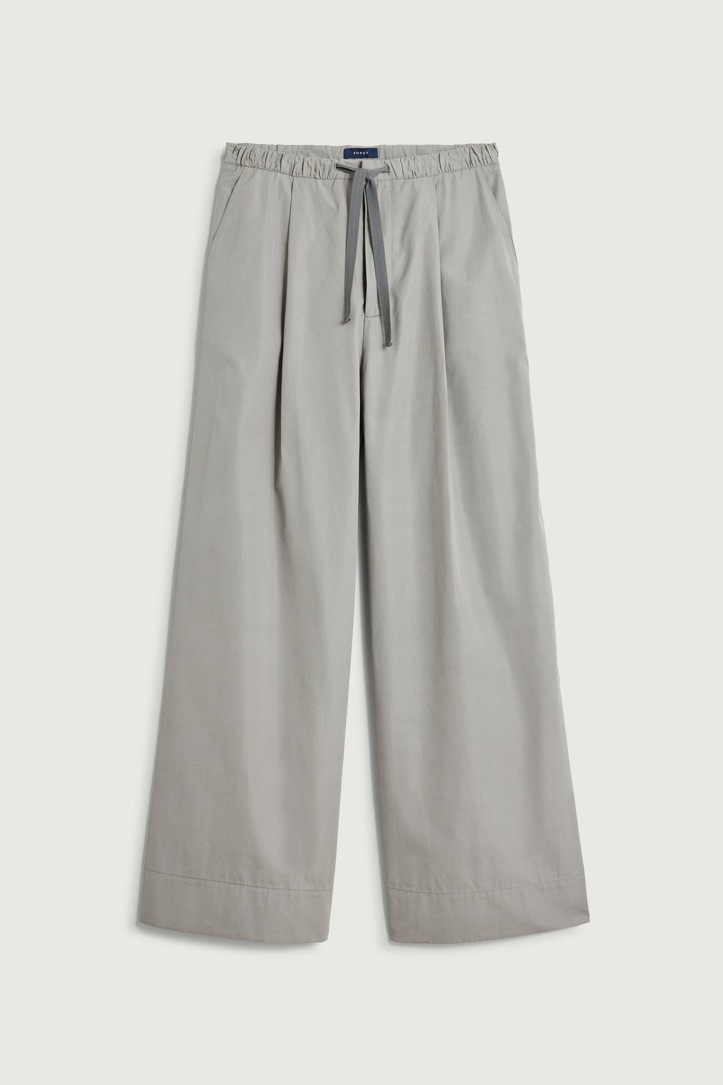 Pantalon à cordons en toile de coton glacée