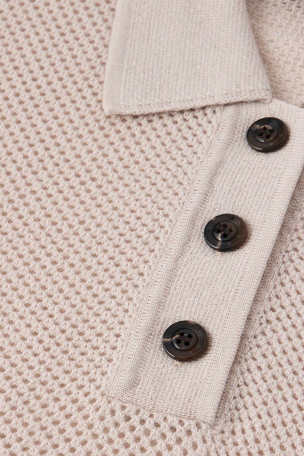 Polo boutonné manches courtes en laine mérinos